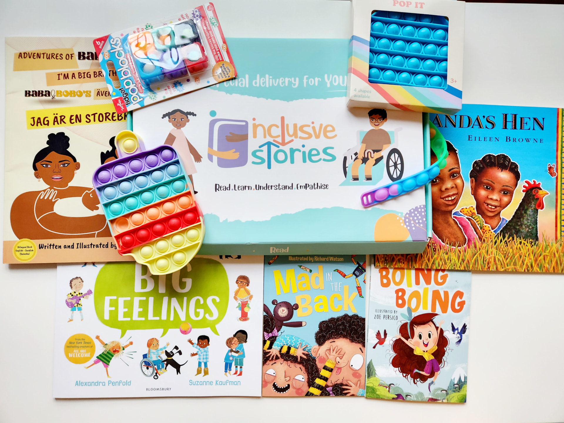 Inclusive Stories family subscription box with inclusive books and sensory toys